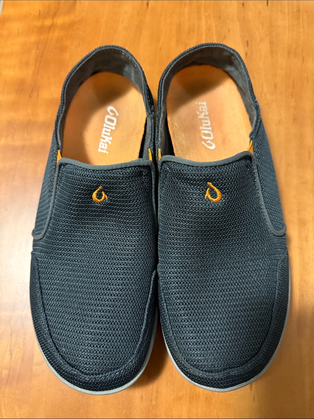 OluKai Men's Charcoal Slip-On Loafers with Orange Logo